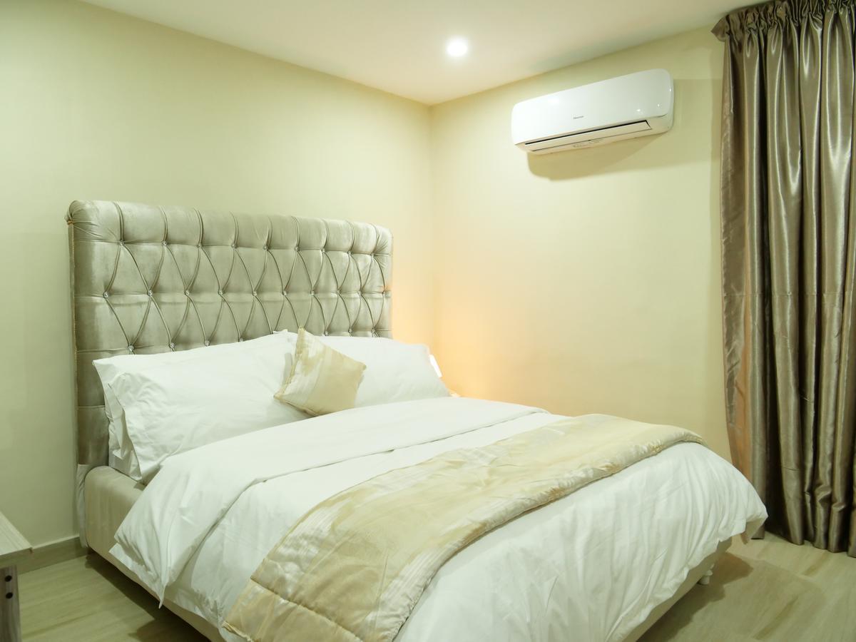 Alexia'S Place Hotel Lagos Bagian luar foto